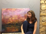 Наталья Разбаева возле своей картины. Нижний Новгород. Фото из социальных сетей