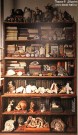 Книжный шкаф в мастерской Дмитрия Краснопевцева. Фото Сергея Шевченко. 2023. Фоторепродукция Татьяны Шепелевой