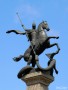 Георгий Победоносец на коне, поражающий змея. Скульптор Т.Г. Холуёва, архитектор В.Д. Васильев. Июль 2010 г.